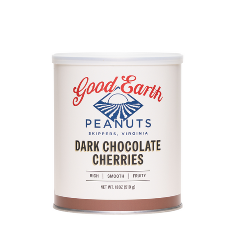 A 18 oz canister of Good Earth Peanuts Dark Chocolate Cherries on a clean white background. The canister has a white label with red and blue branding, and a brown band at the bottom representing the chocolate cherries flavor.