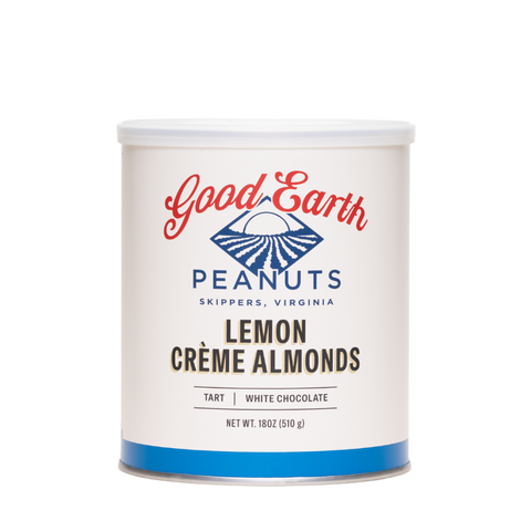 A white cylindrical canister of Good Earth Peanuts Lemon Crème Almonds, featuring a white lid and a label with red and blue branding on a clean white background.