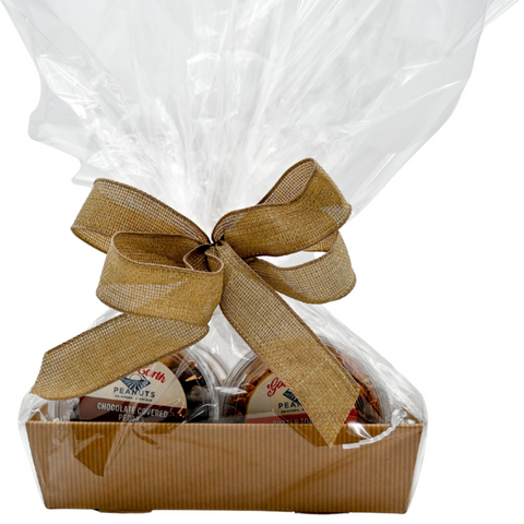 A photo of a package of various good earth peanuts products in a cardboard gift box, wrapped in cellophane with a brown bow.